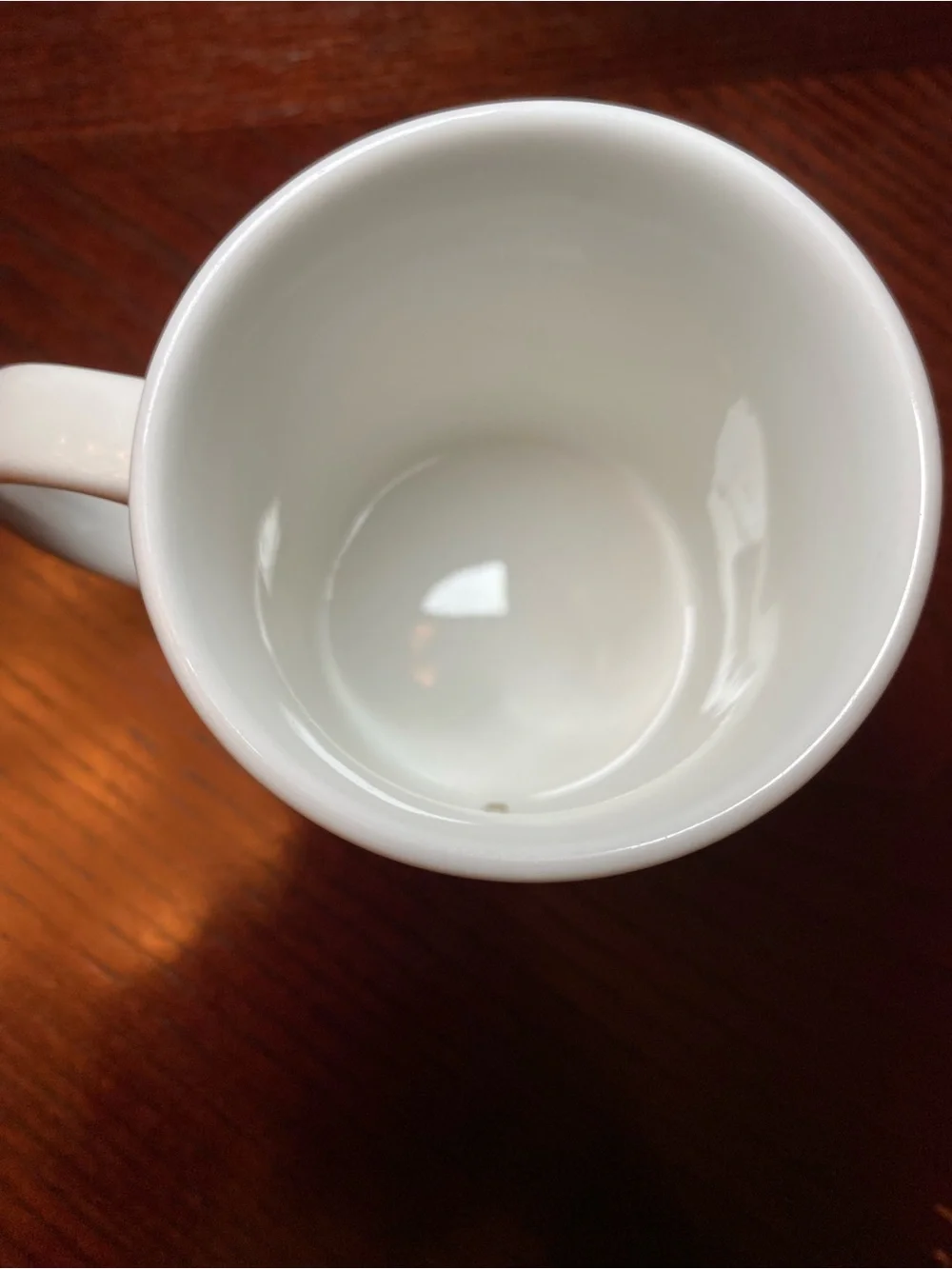 White Ceramic Coffee Mug with Blue KVIL Radio Logo. 10 Oz